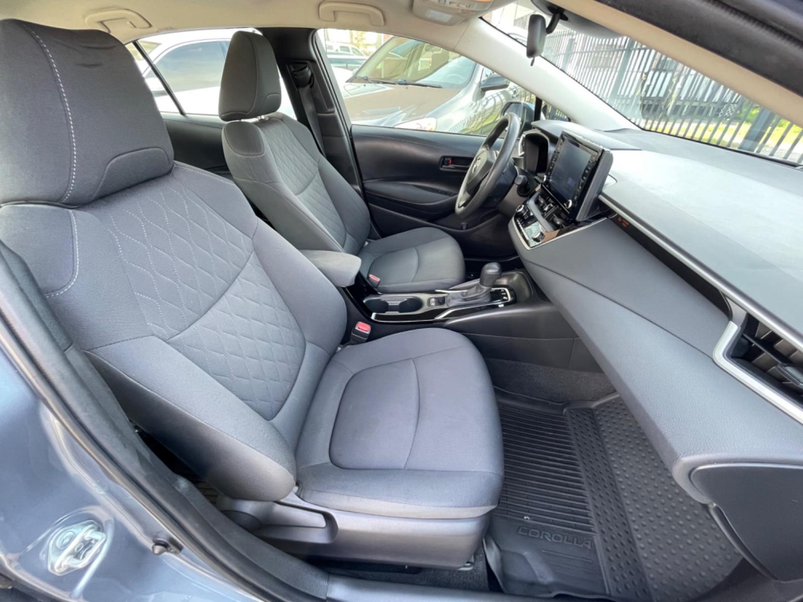 2022 Blue /Silver Toyota Corolla LE (JTDEAMDEXNJ) with an 1.8L Hybrid engine, Automatic transmission, located at 1501 West 15th St., Houston, 77008, (713) 869-2925, 29.797941, -95.411789 - Photo #7